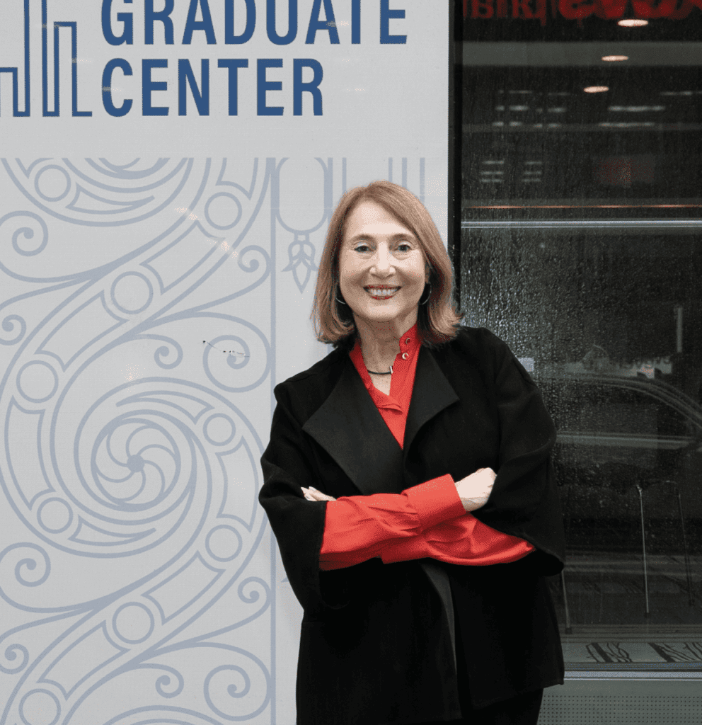 Cathy standing on Fifth Ave, Graduate Center, CUNY